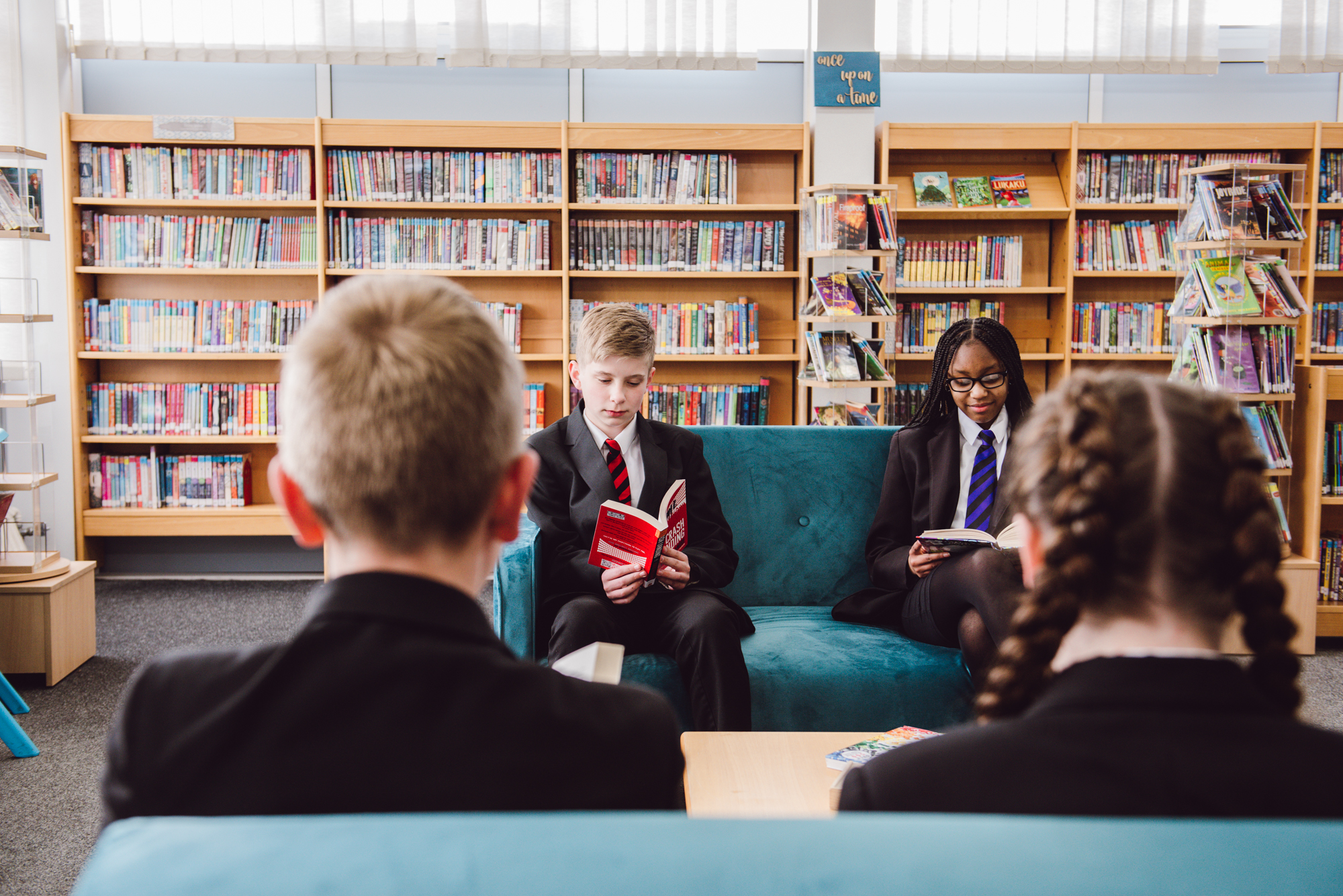 Student socialising in library 